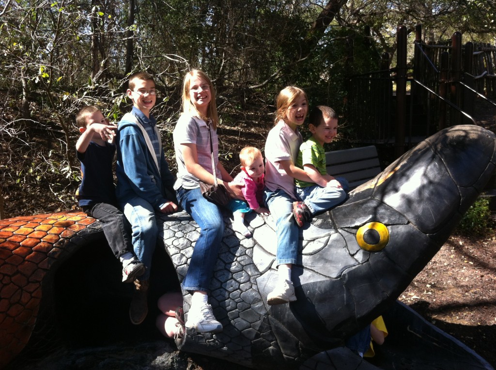 There was a little playground area where the kids posed for me on top of a snake tunnel.
